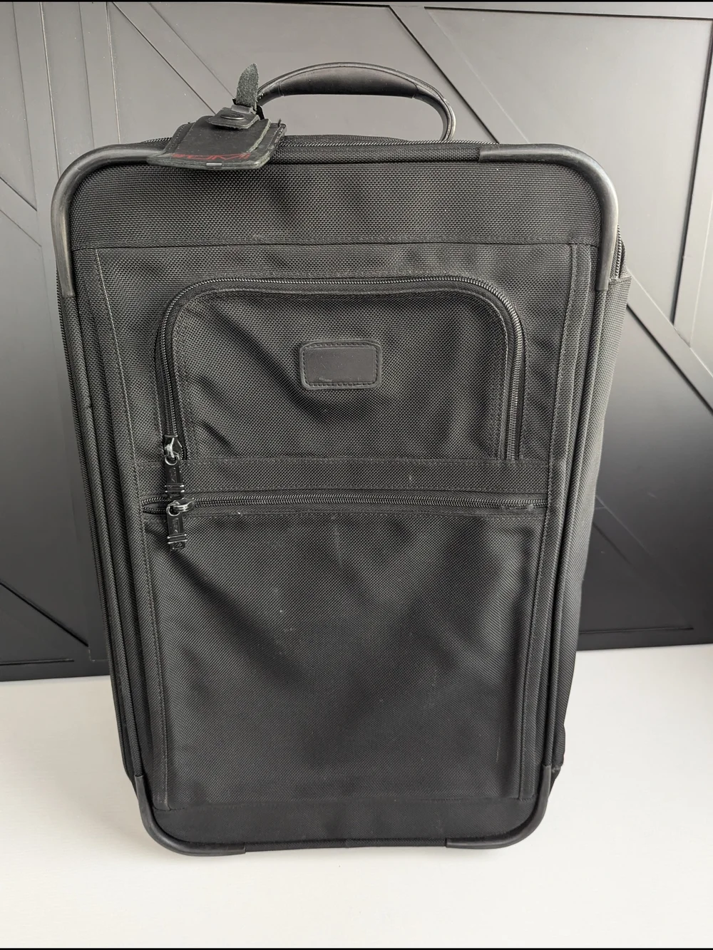 Tumi Black Men’s Carry-On Rolling Travel Bag
